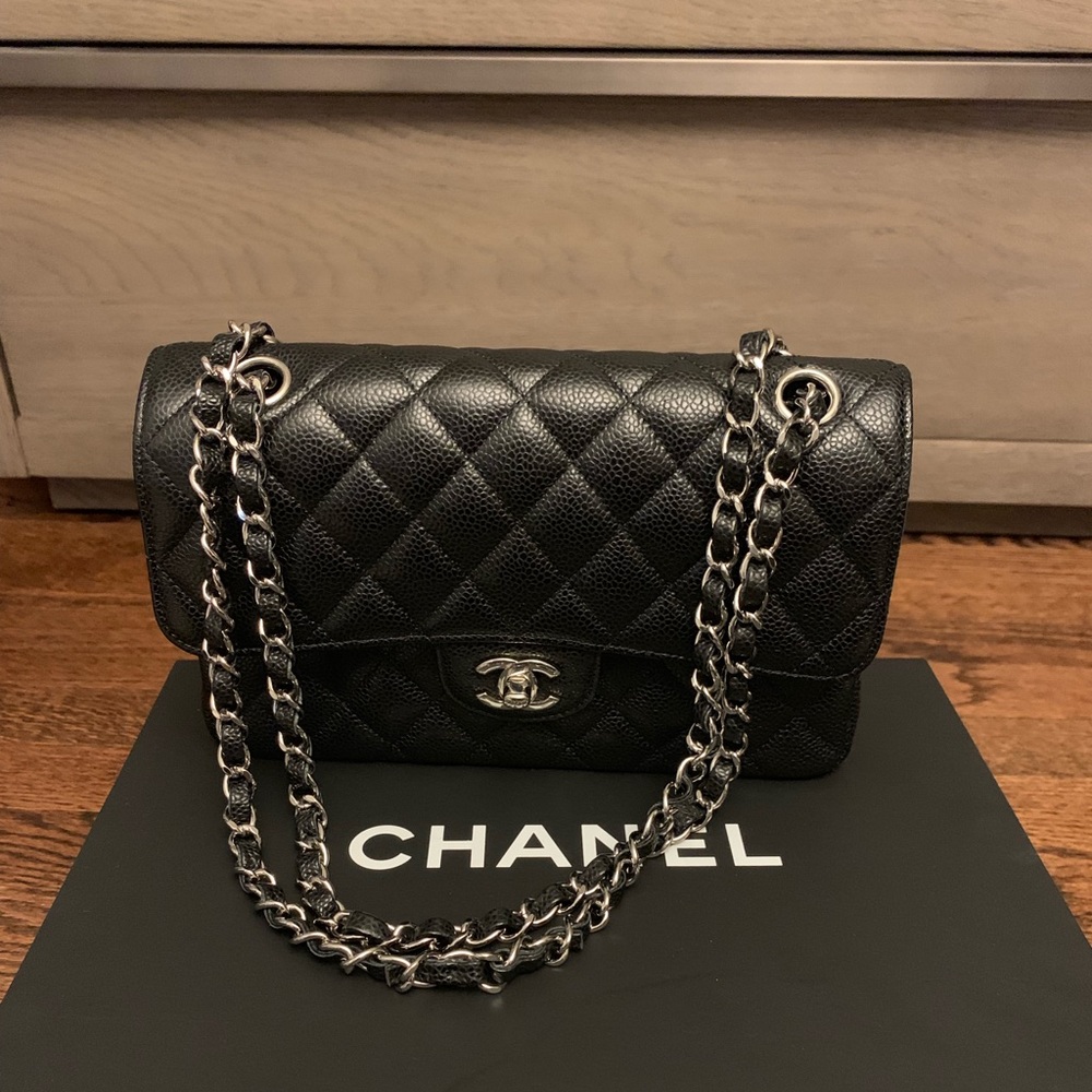 Black small classic Chanel handbag